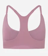 Top deportivo de microfibra color beige, con escote redondo y diseño de espalda nadadora.