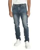 Pantalón de jean estilo skinny, color azul lavado, con diseño de cinco bolsillos, cierre de cremallera y botón metálico.