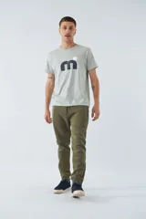 Pantalón de felpa gris para hombre con logo estampado y en goma, bolsillos con cierre, cierres en los tobillos, cintura ajustable y puños.