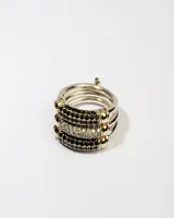 Anillo de plata 925 con dublé de oro y zirconias blancas y negras.
