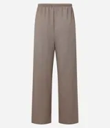 Pantalón wide leg color crudo, con cintura elástica ajustable con cordón y textura.
