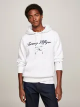 Buzo blanco con capucha de Tommy Hilfiger, con logo de la marca bordado en azul marino en el frente.