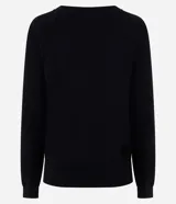 Suéter de punto color celeste, con cuello redondo y mangas largas con puños ajustados. Diseño básico y liso de la marca Marfinno.