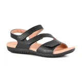 Sandalia plana Usaflex modelo Mali, color negro con textura sutil, plantilla acolchada en tono rosado y suela de goma. Cuenta con tres tiras ajustables con cierre de velcro en la parte superior y en el talón.