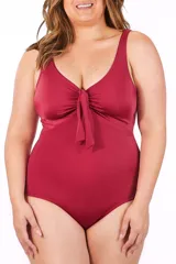 Malla entera color borgoña con escote en V y nudo decorativo en el centro.