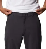Pantalon de senderismo Columbia Tech Trail II, color gris oscuro, con tecnología de repelencia al agua Omni-Shield y protección solar UPF 50. Presenta cintura con elástico parcial, bolsillos laterales y bolsillo de seguridad con cierre.