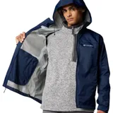 Campera cortaviento Columbia modelo Evapouration II, color azul marino, con capucha integrada, cierre frontal impermeable, ventilación en axilas y puños ajustables.
