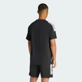 Remera deportiva Adidas de cuello redondo y manga corta, color negro con detalles en blanco en los hombros. Confeccionada con tecnología Climacool para gestión del sudor.