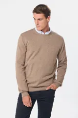 Buzo tejido azul marino de algodón y cashmere, de tejido liviano y cuello redondo.