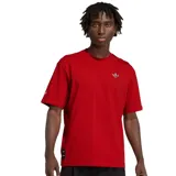 Remera de algodón color rojo con corte holgado, cuello redondo y mangas cortas. Presenta el logo de Adidas Originals bordado en el pecho y una etiqueta decorativa en el ruedo inferior.