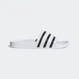 Sandalias Adidas Adilette de color blanco con tres tiras negras en la banda superior y plantilla contorneada.
