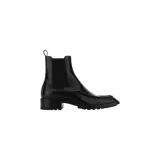 Botas Chelsea Saint Laurent Joe de cuero negro, con paneles laterales elásticos, detalle de costuras en el empeine y suela gruesa track con tacón bajo.