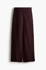 Pantalón sastrero de tiro alto en mezcla de lino y viscosa, color bordó, de pierna ancha y corte recto.
