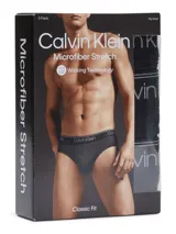 Pack de tres slips negros de microfibra stretch con cintura elástica con logo Calvin Klein.