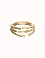 Pulsera rígida de aleación de metales bañada en oro de 18k, con diseño de tres tubos paralelos.