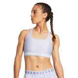 Top deportivo Under Armour de soporte medio, color negro, con diseño de espalda cruzada y banda elástica inferior con el logo de la marca estampado.