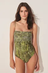 Traje de baño enterizo verde con estampado de cactus y breteles finos.