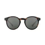 Lentes de sol Izipizi modelo M, con montura redonda color carey y lentes grises.