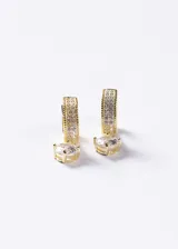 Aros abridores tipo argolla de plata 925 con baño en oro de 18k, pavé de zirconias y dije colgante de piedra zirconia redonda.