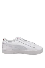 Championes Puma modelo Jada, color blanco con detalles en tono rosado metalizado, de diseño urbano y suela plataforma.
