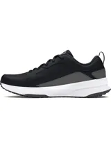 Championes de entrenamiento Under Armour modelo Charged Edge, color negro con detalles en gris y suela blanca. Presentan parte superior de malla transpirable con revestimientos de cuero y material sintético, entresuela Charged Cushioning para amortiguación y suela de goma con tracción.