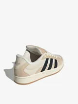 Zapatillas Adidas Campus 00s Beta color beige con las tres tiras laterales en negro.