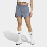 Short deportivo Adidas de tiro alto con cintura elástica ancha, confeccionado en tejido liviano con aberturas laterales para mayor libertad de movimiento. Incluye tecnología Climacool para absorción de sudor y logo de la marca estampado en el frente.