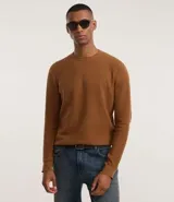 Suéter masculino de punto piqué con textura, cuello redondo y mangas largas. Presenta un diseño básico y versátil con un calce confortable.
