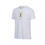 Remera Nike blanca de manga corta con cuello redondo. Presenta el escudo de la Asociación Uruguaya de Fútbol (AUF) en dorado y negro, con cuatro estrellas doradas encima, y el logo de Nike dorado debajo.