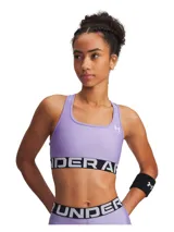 Top deportivo de soporte medio con espalda cruzada y banda elástica inferior con logo de la marca. Confeccionado en tejido HeatGear de secado rápido y alta elasticidad.