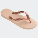 Ojotas Havaianas Top Tiras Flip Flops, color rosado, con tiras texturizadas y logo de la marca en relieve.