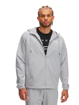 Campera deportiva Under Armour Rivl Wvn Windbreaker, color gris claro, con capucha ajustable con cordón, cierre frontal completo, bolsillos laterales con cierre y logo estampado en el pecho.