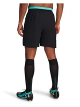 Short deportivo Under Armour de la colaboración con Mansory, en color negro. Presenta un diseño de doble capa con calza interna integrada en color turquesa, cintura elástica con cordón y logos de la marca y la colaboración en contraste.