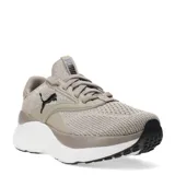 Championes Puma modelo Softride Mayve, con capellada de tejido respirable en color negro. Presenta entresuela blanca con detalles en verde agua y logo de la marca en plateado en el lateral.