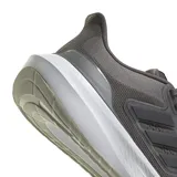 Championes de running Adidas modelo Ultrabounce, color gris oscuro con entresuela blanca y suela gris claro. Presentan diseño de malla transpirable, cordones al tono y las icónicas tres tiras laterales en material sintético.
