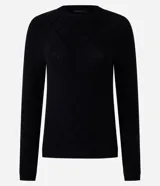 Suéter de punto color marrón, con cuello redondo, manga larga y textura geométrica de losângos.