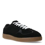 Championes urbanos de mujer, color negro, con detalles en animal print (cebra) en los laterales y cordones blancos. Suela de goma color caramelo.