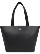 Cartera Tommy Hilfiger tipo tote color negro, confeccionada en poliuretano con acabado liso. Tiene doble asa superior, compartimento principal con cierre de cremallera y logo de metal en la parte delantera.