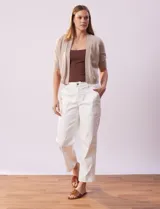 Bolero tejido color fucsia, marca Ninety, de manga corta con apliques de botones.