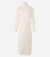 Vestido midi de punto de la marca Marfinno, con cuello alto y mangas largas. Presenta un diseño ajustado al cuerpo y tejido de punto recto.