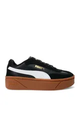 Championes Puma modelo Club II Era Platform Wns, color blanco con detalles en negro y suela plataforma de goma marrón.