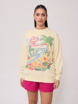 Sweater color crema con estampado frontal de motivos playeros y bordado. Confeccionado en 60% algodón y 40% poliéster.