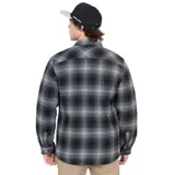Camisa overshirt de franela a cuadros grises y negros, con forro interior de tafeta. Tiene calce regular, cierre frontal con botones metálicos, cuello camisero, dos bolsillos con tapa en el pecho y dos bolsillos laterales.