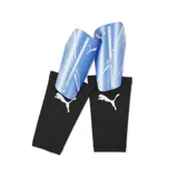 Canilleras Puma Attacanto azules con logo de Puma en blanco.