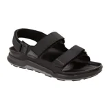 Sandalia Birkenstock modelo Tatacoa de diseño ergonómico, color negro, con tiras de ajuste de velcro y correa de talón. Presenta suela de goma con relieve y plantilla anatómica.