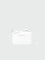 Bandolera Longchamp modelo Box-Trot XS, color morado, con correa fina al hombro y logo circular en el frente.