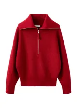 Jersey de punto rojo con cuello solapa y cierre frontal con cremallera, de manga larga y ajuste holgado.