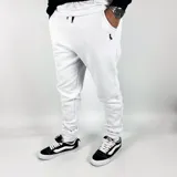 Pantalón de jogging blanco de algodón con felpa, corte ajustado y puños elásticos.