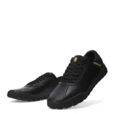 Zapatos Caterpillar modelo Hex + Cuero, color negro, estilo sneaker de caña baja con cordones. Presentan una capellada de cuero liso y textil, con suela de goma gruesa con patrón hexagonal en relieve. El logo Caterpillar en amarillo se encuentra en el lateral.