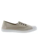 Zapatillas de lona color beige sin cordones, con puntera de goma blanca y suela de caucho vulcanizado.